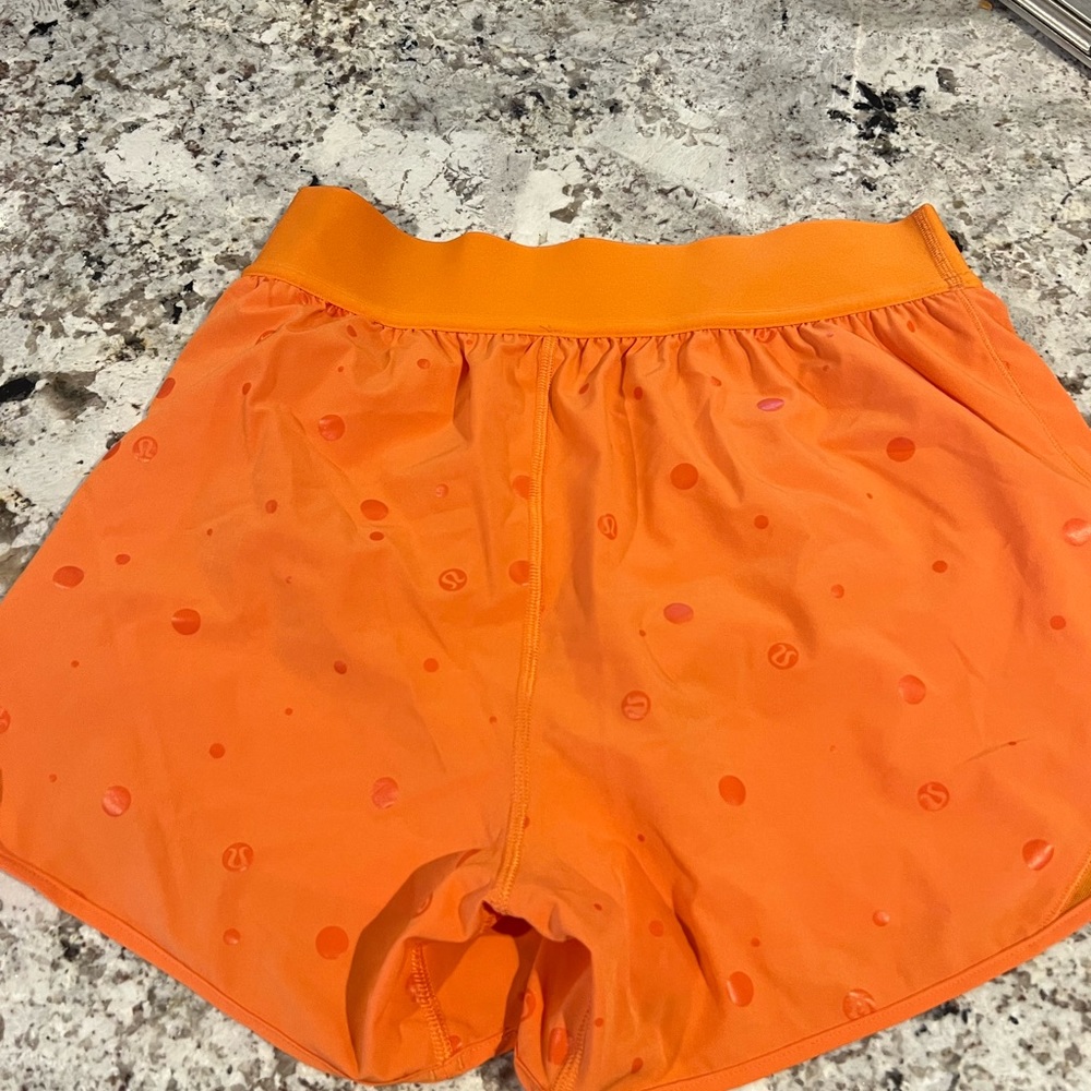 Like new Lululemon size 6 pok a dot shorts!